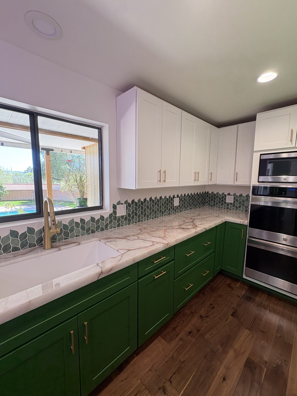 Green and white custom kitchen